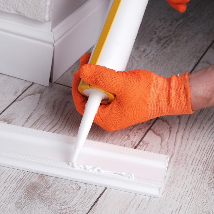 How long does high grab adhesive take to dry and cure? Contractor bonding white skirting board with high grab adhesive